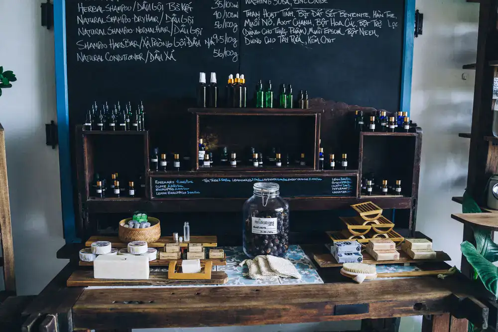 A shelf displaying natural handmade soaps in a boutique setting